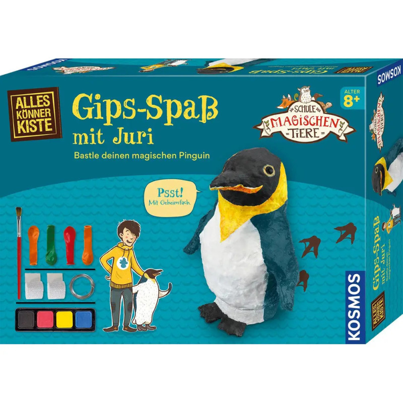 Bastelset-Box Pinguin mit Bastelmaterial und bebilderter Anleitung auf Deutsch.