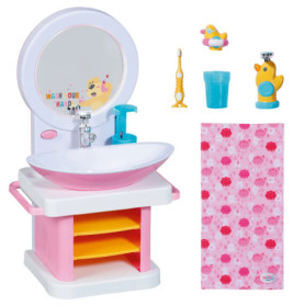 Kinderspielzeug-Waschbecken mit Spiegel, Zahnbürste, Becher, Quietscheente, Seifenspender und rosa Handtuch.