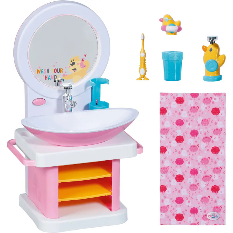 Kinderspielzeug-Waschbecken mit Spiegel, Zahnbürste, Becher, Quietscheente, Seifenspender und rosa Handtuch. Kinderspielzeug-Waschbecken mit Spiegel, Zahnbürste, Becher, Quietscheente, Seifenspender und rosa Handtuch.