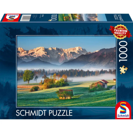 Schmidt Puzzle mit 1000 Teilen: Alpenlandschaft mit grünen Wiesen, Bäumen und rustikalen Scheunen.