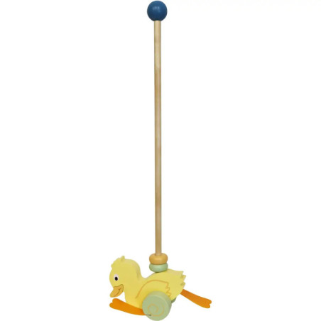 Gelbes Holz-Schiebespielzeug in Entenform, orange Füße, langer Griff mit blauem Knauf.