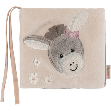Weiches, beiges Babybuch mit Esel-Gesicht, rosa Schleife und Blumenmotiv auf dem Umschlag.