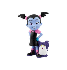 Ein blauhäutiges Cartoon-Mädchen mit Zöpfen, schwarzem Kleid und kleinem lila-weißem Hund an ihrer Seite.