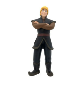 Eine Figur eines blondhaarigen Mannes in schwarzer Kleidung, stehend, mit verschränkten Armen und lächelnd.