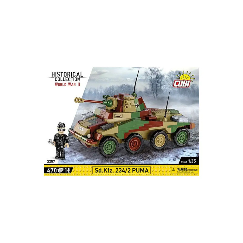 Box eines COBI WWII Spielsets mit getarntem Sd.Kfz. 234/2 Puma Panzerfahrzeug und einer Minifigur. Box eines COBI WWII Spielsets mit getarntem Sd.Kfz. 234/2 Puma Panzerfahrzeug und einer Minifigur.