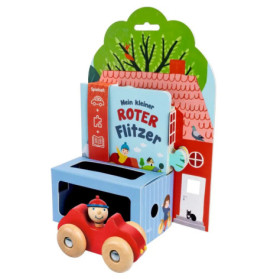 Holzspielzeugauto mit lächelndem Fahrer vor buntem Kinderbuch und Häuserillustration.