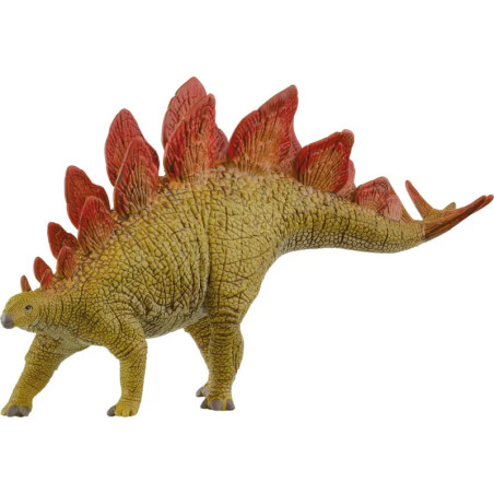 Grünes Stegosaurus-Spielzeug aus Plastik mit roten Rückenschildern steht auf allen vieren.
