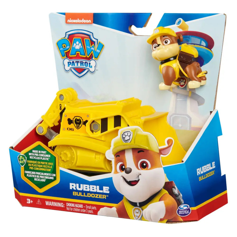 PAW Patrol Rubble Bulldozer Spielzeug in gelber Verpackung, oben drauf eine Rubble Hundefigur. PAW Patrol Rubble Bulldozer Spielzeug in gelber Verpackung, oben drauf eine Rubble Hundefigur.