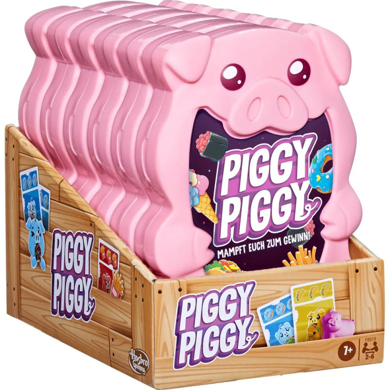 Piggy Piggy Brettspiel in rosa, schweineförmigen Boxen auf einem Regal mit Holzoptik ausgestellt. Piggy Piggy Brettspiel in rosa, schweineförmigen Boxen auf einem Regal mit Holzoptik ausgestellt.