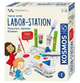 Box eines Kinderwissenschaftslaborkits mit abgebildeten Kindern, Laborwerkzeugen und bunten Experimentillustrationen.