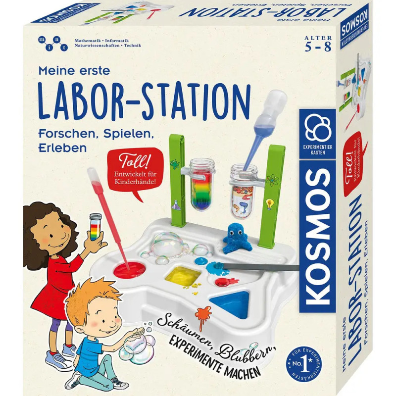 Box eines Kinderwissenschaftslaborkits mit abgebildeten Kindern, Laborwerkzeugen und bunten Experimentillustrationen.