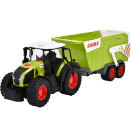 Grüner Spielzeugtraktor mit weißem Dach zieht passende grüne CLAAS-Anhänger mit roten Rädern.