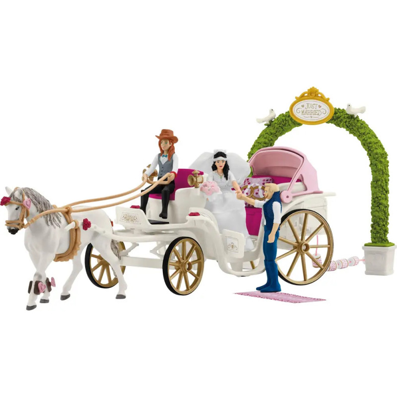 Spielzeug-Hochzeitskutsche mit Braut, Bräutigam, Pferd, Fahrer, Gast und Just Married-Bogen im Hintergrund. Spielzeug-Hochzeitskutsche mit Braut, Bräutigam, Pferd, Fahrer, Gast und Just Married-Bogen im Hintergrund.