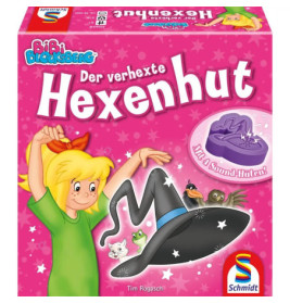 Ein lächelndes Mädchen winkt einem fliegenden Zauberhut mit Tieren auf einer pinken Hexenhut-Spieleschachtel.
