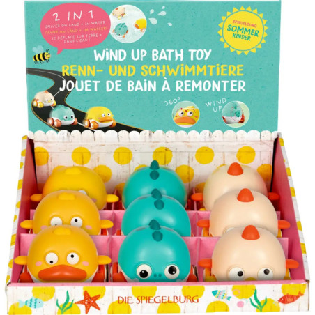Aufziehbare Badetiere in Vogel-Form in einer bunten Box mit verspielten, sommerlichen Motiven und Text.