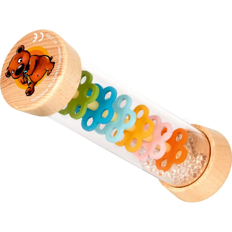 Klare Röhre mit Holzenden, bunten Zahnrädern im Inneren und einem Bärenmotiv auf einem Deckel.