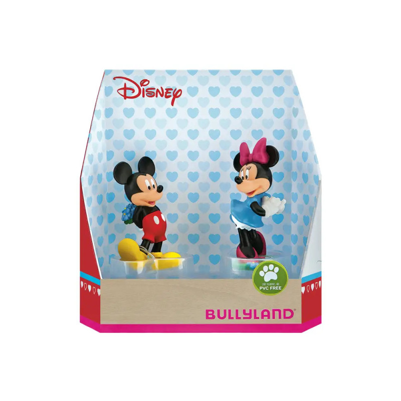 Micky- und Minnie-Maus-Figuren in einer Bullyland-Disney-Box vor blauem Herzmuster-Hintergrund. Micky- und Minnie-Maus-Figuren in einer Bullyland-Disney-Box vor blauem Herzmuster-Hintergrund.