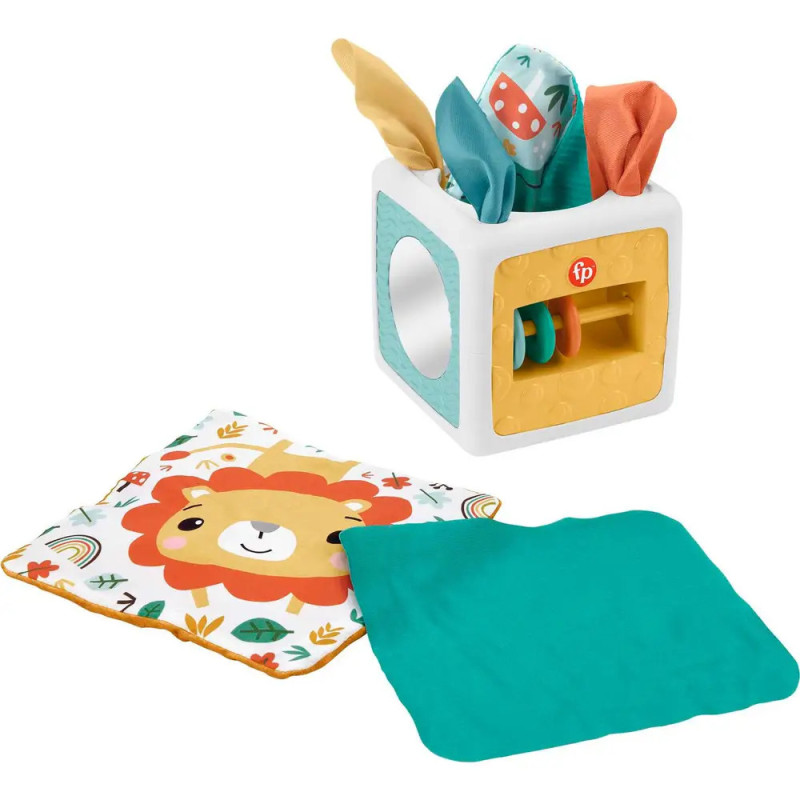 Bunter Baby-Sinneswürfel mit Stofftaschentüchern, Löwenmatte und türkisfarbenem Tuch auf weißem Hintergrund. Bunter Baby-Sinneswürfel mit Stofftaschentüchern, Löwenmatte und türkisfarbenem Tuch auf weißem Hintergrund.