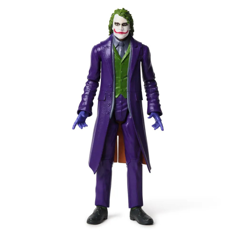 Actionfigur eines lächelnden Clown-Bösewichts im lila Mantel, grüner Weste und Handschuhen, aufrecht stehend. Actionfigur eines lächelnden Clown-Bösewichts im lila Mantel, grüner Weste und Handschuhen, aufrecht stehend.