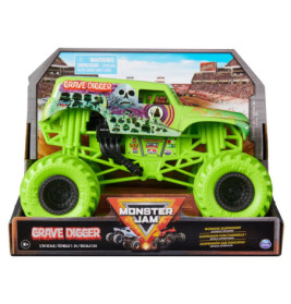 Grüner Grave Digger Monster Jam Spielzeugtruck in Verpackung vor Stadionhintergrund mit auffälligem Branding.