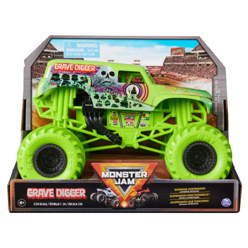 Grüner Grave Digger Monster Jam Spielzeugtruck in Verpackung vor Stadionhintergrund mit auffälligem Branding.