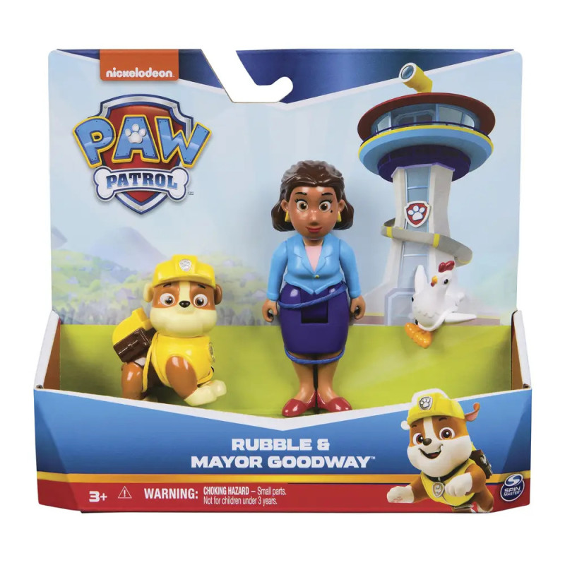 Paw Patrol-Figuren Rubble und Bürgermeisterin Goodway in Verpackung vor Turm-Hintergrund.