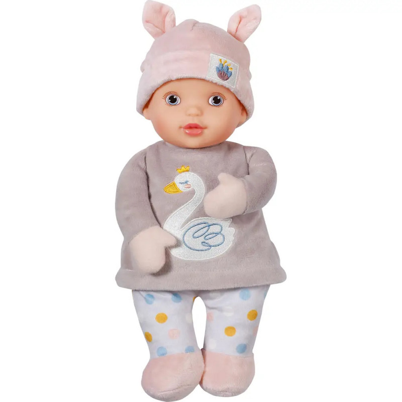 Babypuppe mit rosa Mütze mit Ohren, grauem Shirt mit Schwan und gepunkteter Hose. Babypuppe mit rosa Mütze mit Ohren, grauem Shirt mit Schwan und gepunkteter Hose.