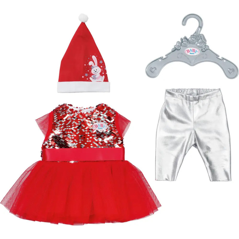 Rotes Paillettenkleid, silberne Leggings, Santa-Mütze mit Hase und grauem Bügel auf weißem Hintergrund. Rotes Paillettenkleid, silberne Leggings, Santa-Mütze mit Hase und grauem Bügel auf weißem Hintergrund.