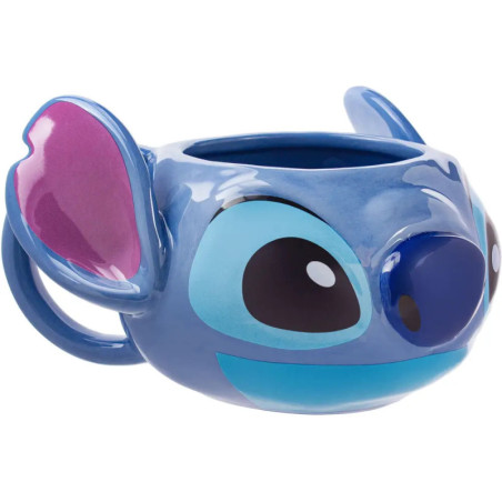 Blaue Tasse aus Keramik in Form eines Cartoon-Aliens mit großen Augen, blauer Nase und rosa Ohren.