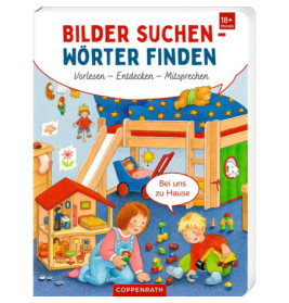 Zwei Kinder spielen in einem bunten, gemütlichen Zimmer mit Hochbett sowie verstreuten Bauklötzen und Büchern.