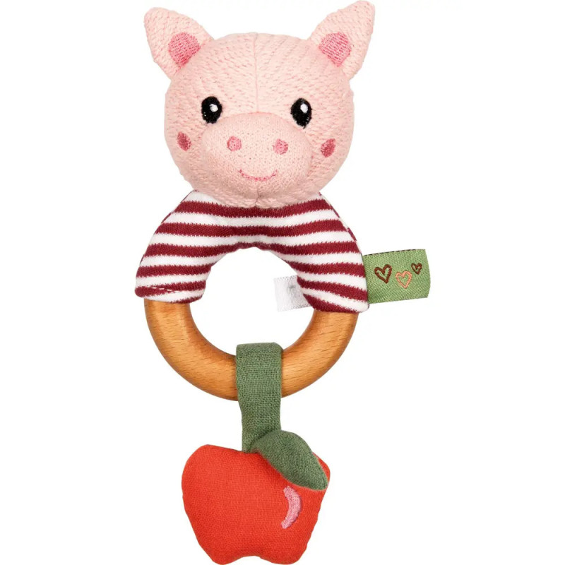 Eine Babyrassel mit Plüsch-Schweinekopf, Holzring und rotem Apfelstoff am unteren Ende. Eine Babyrassel mit Plüsch-Schweinekopf, Holzring und rotem Apfelstoff am unteren Ende.
