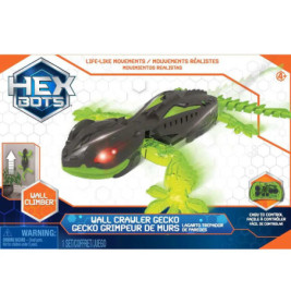 Hexbug Gecko-Spielzeug im Karton, schwarzer Körper, grüne Beine, als Wall Climber gekennzeichnet.