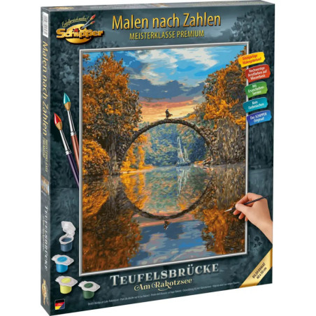 Malset mit Motiv: Teufelsbrücke über einen See bei Sonnenuntergang, umgeben von Bäumen.