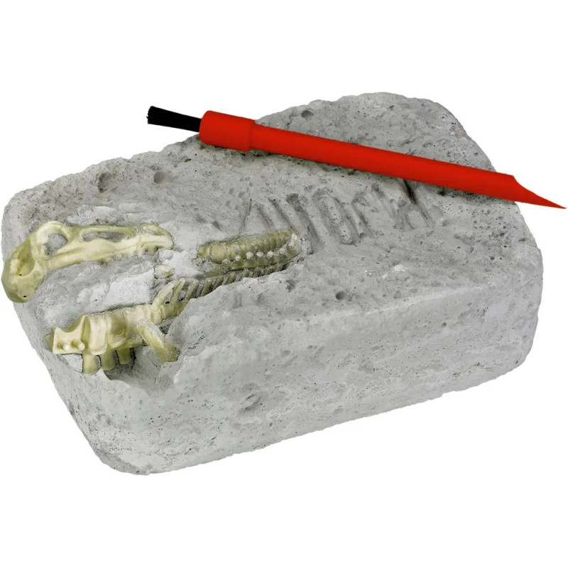 Spielzeug-Dinosaurier-Ausgrabungsset mit rotem Werkzeug auf grauem Block.