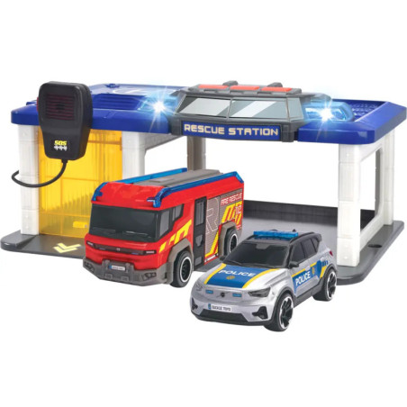 Spielzeug-Rettungsstation mit rotem Feuerwehrauto, blauem Polizeiauto und schwarzem Intercom an der Seite.