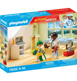 Playmobil Action Heroes Set mit Arzt, Kind-Patient und medizinischem Zubehör in einem Raum auf der Verpackung.