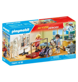 Playmobil Action Heroes Reha-Set: Figuren in einem Therapieraum mit medizinischem Equipment auf der Verpackung.