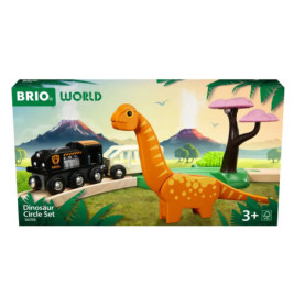 Brio World Dinosaurier Kreis Set: Spielzeugverpackung mit schwarzem Zug, orangefarbenem Dino und pinkem Baum vorne.