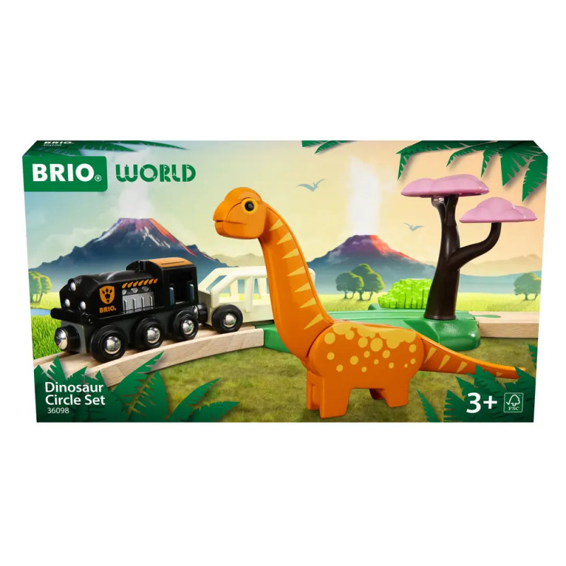 Brio World Dinosaurier Kreis Set: Spielzeugverpackung mit schwarzem Zug, orangefarbenem Dino und pinkem Baum vorne.