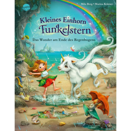 Ein Mädchen und ein Einhorn spielen am Meer unter einem Regenbogen, umgeben von Tieren und Muscheln.