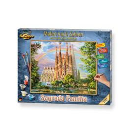 Malen-nach-Zahlen-Set mit Sagrada Familia, Farbbehältern, Pinseln und einer Hand beim Ausmalen der Vorlage.