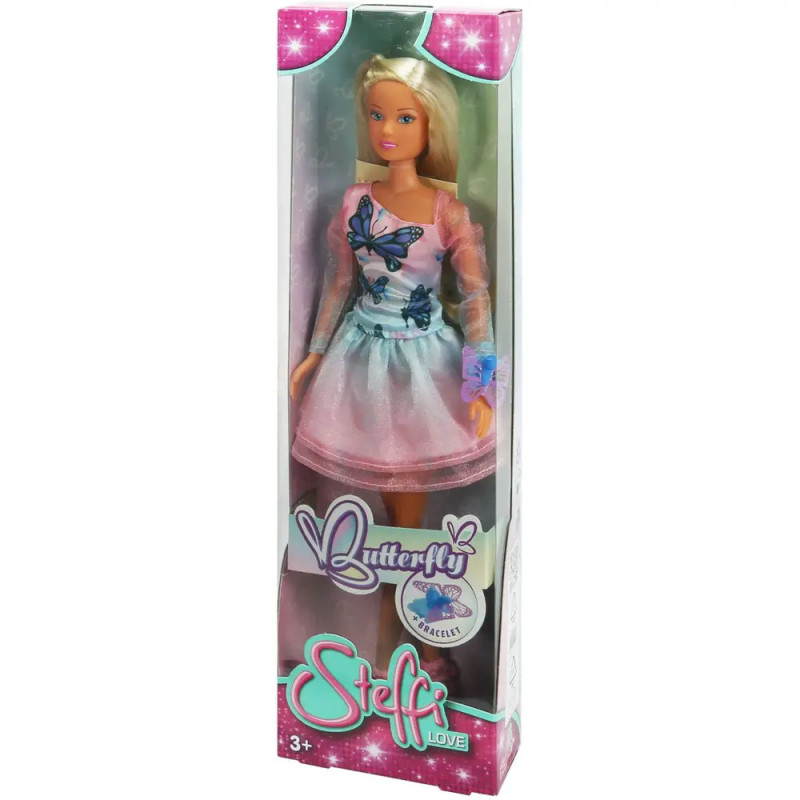 Steffi Love Puppe im pinken Kleid mit Schmetterlingsmotiven, verpackt in einer hohen, bunten Box. Steffi Love Puppe im pinken Kleid mit Schmetterlingsmotiven, verpackt in einer hohen, bunten Box.