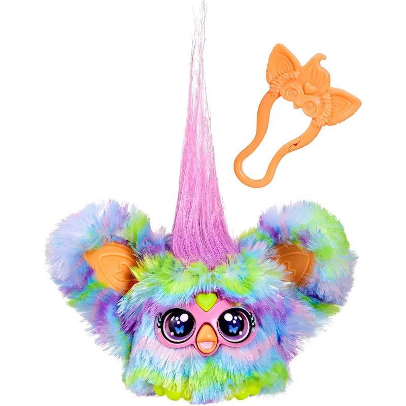 Buntes, flauschiges Plüschtier mit großen Augen, rosa Haarschopf und orangefarbenem Haarclip in Flügelform.