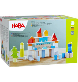 Box mit bunten HABA-Bausteinen ab 1 Jahr, die zu einer Burg aufgebaut sind.