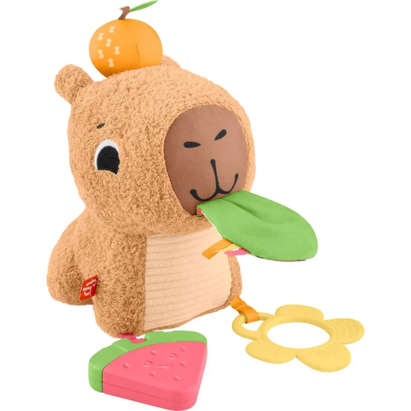Plüschbär mit Orange auf dem Kopf, grüner Zunge sowie befestigten Erdbeer- und Blüten-Beißringen. Plüschbär mit Orange auf dem Kopf, grüner Zunge sowie befestigten Erdbeer- und Blüten-Beißringen.