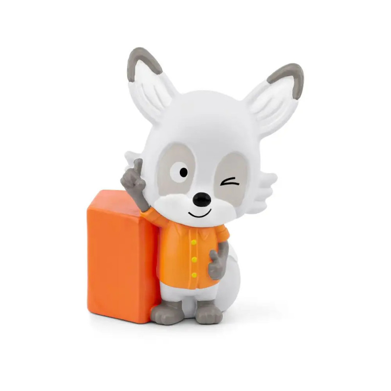 Eine tierische Figur mit orangem Shirt zwinkert und steht neben einem orangefarbenen Block.