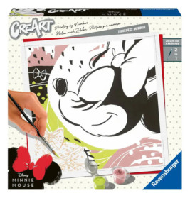 Eine Hand bemalt auf einer CreArt Disney Malen-nach-Zahlen-Box ein schwarz-weißes Minnie-Mouse-Motiv.