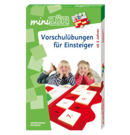 Zwei lächelnde Kinder liegen auf einem roten Lernbrett darauf steht: Vorschulübungen für Anfänger.