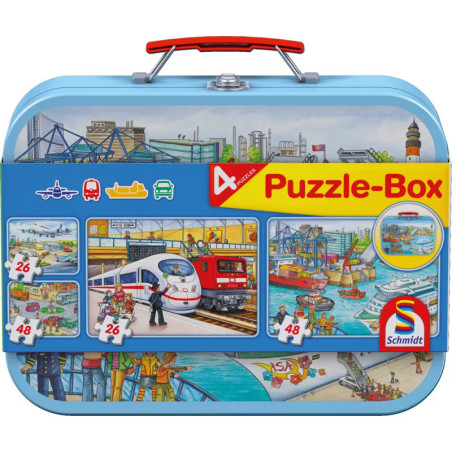 Blaue Puzzlebox von Schmidt mit Motiven von Zügen, Booten, Flughafen und Stadt. Blaue Puzzlebox von Schmidt mit Motiven von Zügen, Booten, Flughafen und Stadt.