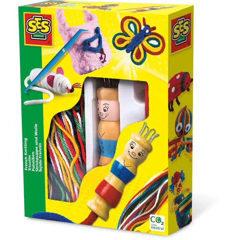 Strickpuppe und Wolle